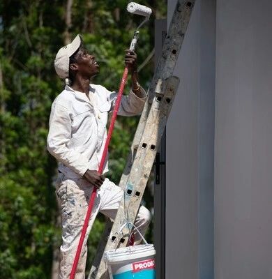 Wall being painted with roller
